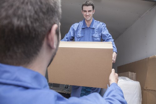 Flat removals in Greenwich with moving boxes prepared for transport