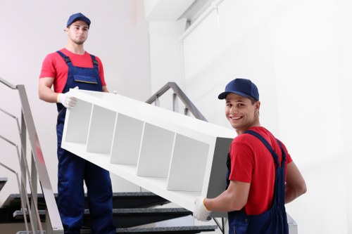 Carefully wrapped furniture and boxes for a Greenwich flat move