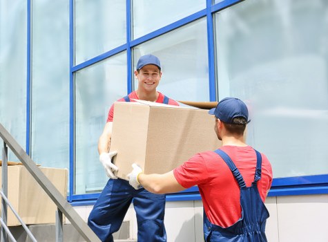 Packing boxes and furniture ready for Greenwich removals
