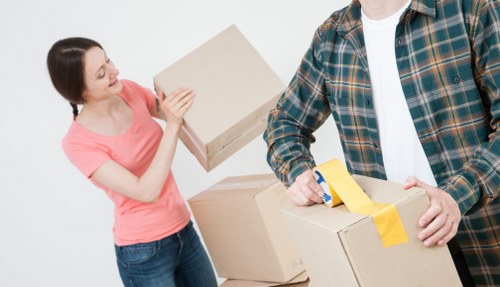 Space-saving storage solution for Greenwich residents with furniture and boxes