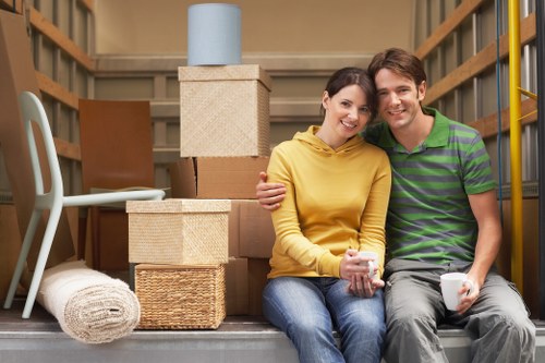 Professional office removal team handling furniture transport